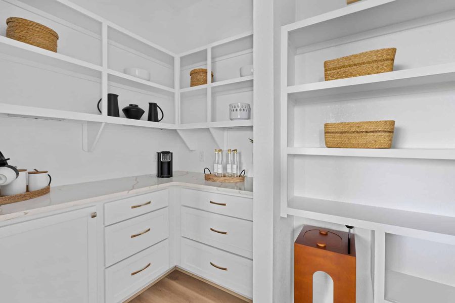 Representative furnished interior of a home built from the Lauren by Chesmar Homes in Wood Leaf Reserve, Tomball (Image 19).