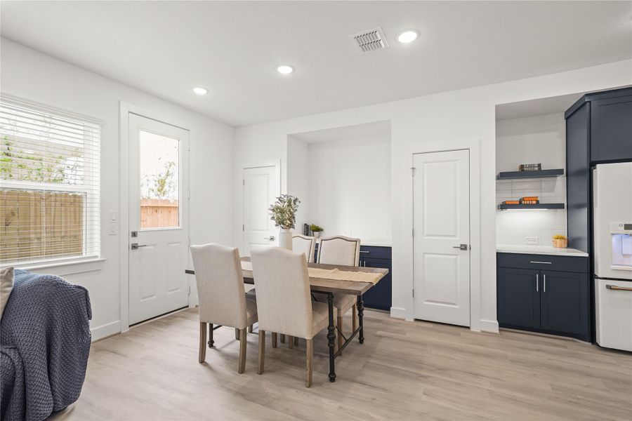 Sun-lit dining area Sun-lit dining area