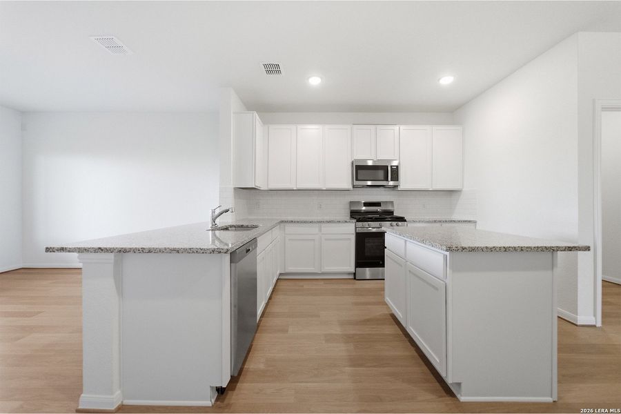 Furnished interior view inside a new home in Garden Grove, San Antonio (Image 9).