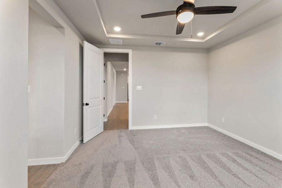Representative unfurnished interior of a home built from the Pecos by Hakes Brothers in Highland Ridge, New Braunfels (Image 32).