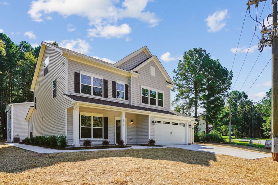 Representative exterior photo of a completed home built from the Badin by Caruso Homes in Blue Run, Raleigh, NC (Image 31). Representative exterior photo of a completed home built from the Badin by Caruso Homes in Blue Run, Raleigh, NC (Image 31).