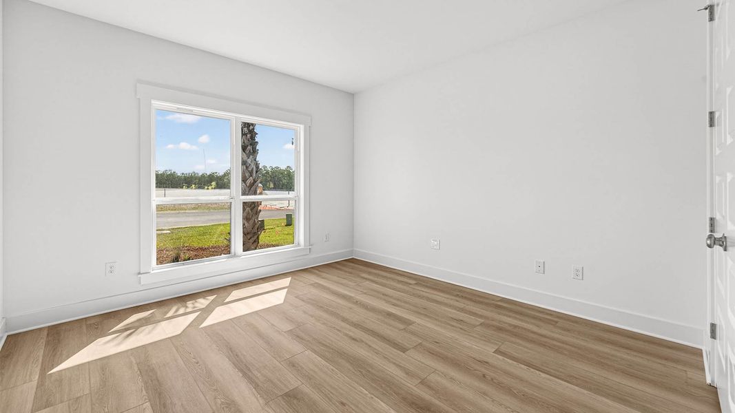 Representative unfurnished interior of a home built from the The Lily by D.R. Horton in WindMark Beach, Port Saint Joe (Image 29).