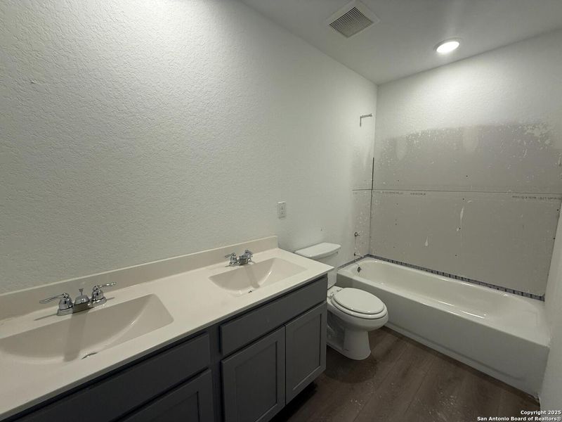 Furnished interior view inside a new home in Meadows at Hennersby Hollow 40's, San Antonio (Image 13).