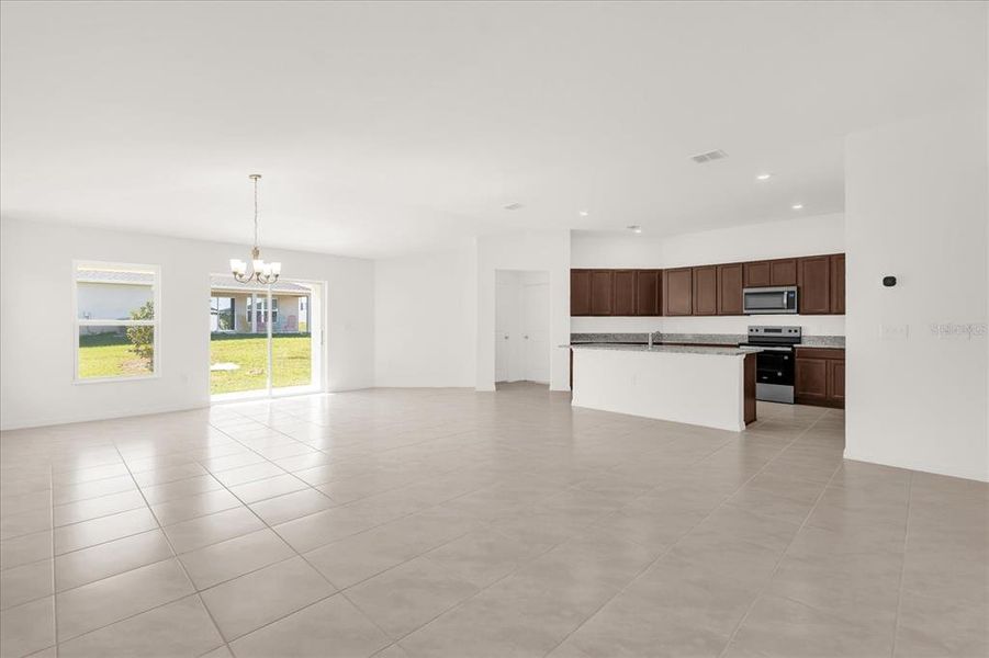 Spacious, unfurnished interior of a new home in Landings at Lake Mabel Loop, Dundee (Image 11).