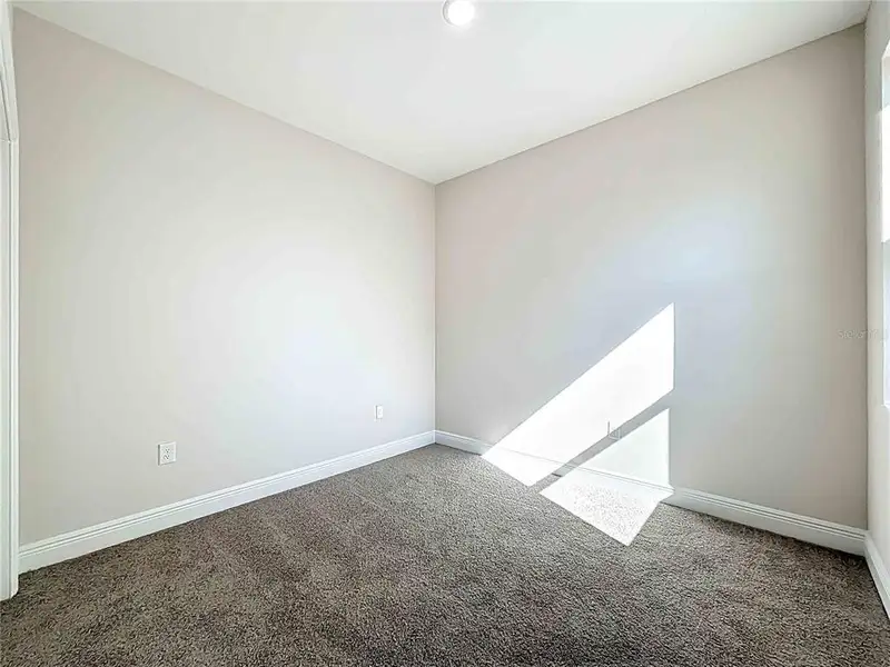 Spacious, unfurnished interior of a new home in , North Port (Image 44).