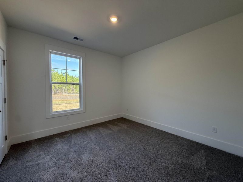 Spacious, unfurnished interior of a new home in Westwood Reserve, Conway (Image 29).