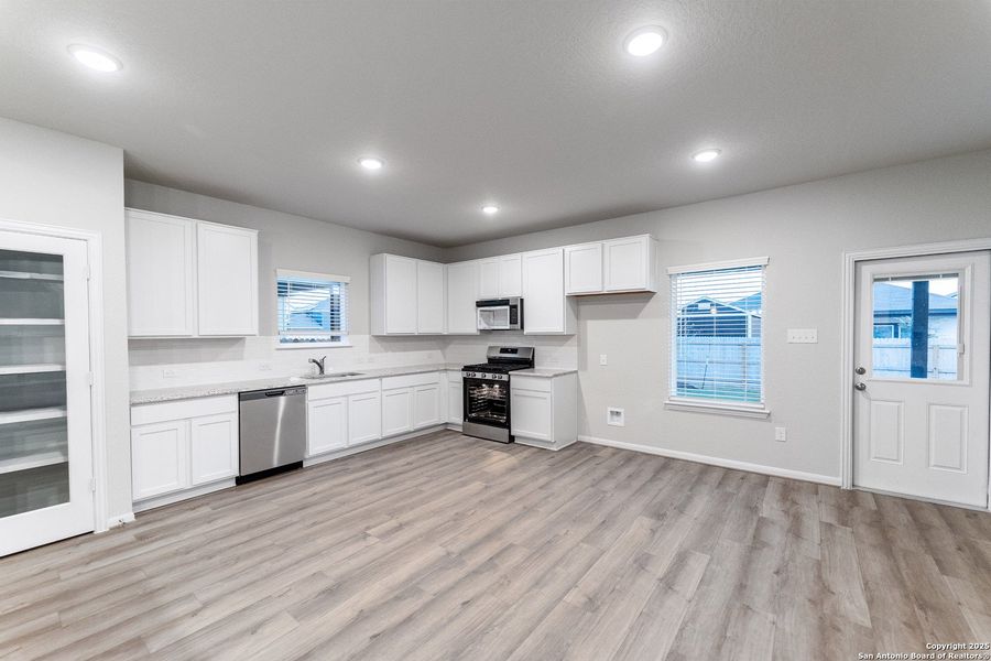 Furnished interior view inside a new home in Hennersby Hollow, San Antonio (Image 9).