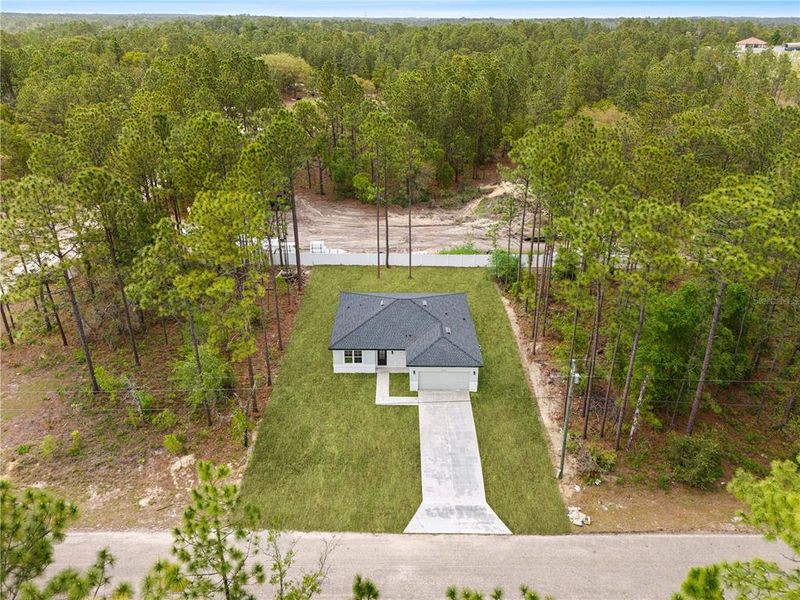 Front exterior of a new home in , Citrus Springs, FL, highlighting curb appeal (Image 20).
