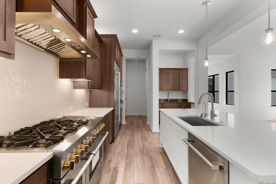 Furnished interior view inside a new home in El Sonido at Campanas, San Antonio (Image 10).