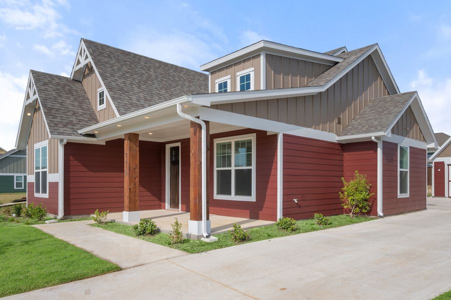 Front exterior of a new home in Heritage Towne, Midlothian, TX, highlighting curb appeal (Image 26). Front exterior of a new home in Heritage Towne, Midlothian, TX, highlighting curb appeal (Image 26).