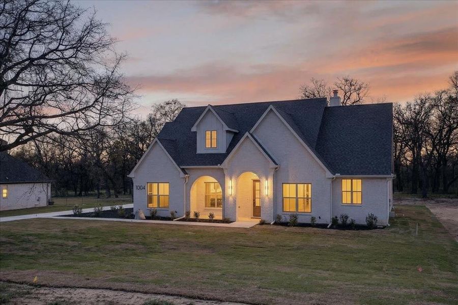 Front exterior of a new home in , Azle, TX, highlighting curb appeal (Image 25).