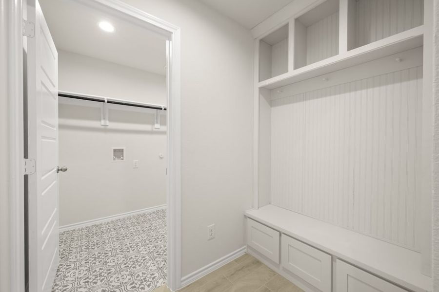 Front exterior of a new home in Myrtle Creek, Waxahachie, TX, highlighting curb appeal (Image 16). Front exterior of a new home in Myrtle Creek, Waxahachie, TX, highlighting curb appeal (Image 16).