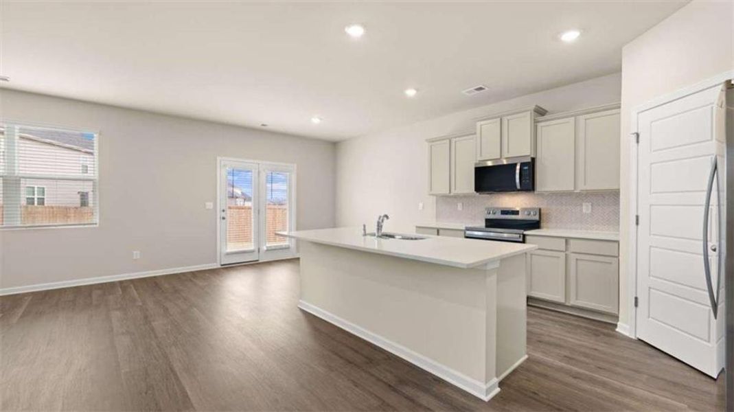Furnished interior view inside a new home in The Preserve at Agricultural Village, Perry (Image 4).