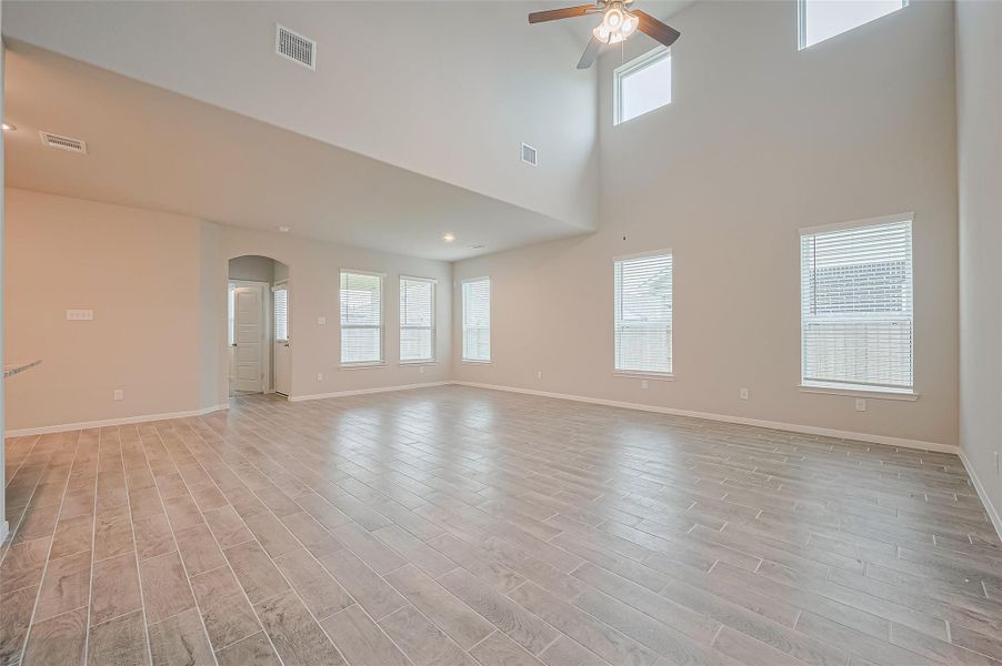 Spacious, unfurnished interior of a new home in Sunterra, Katy (Image 40).