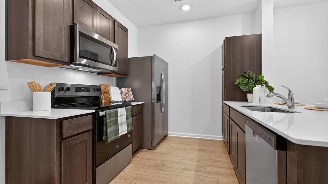 Representative furnished interior of a home built from the Bradford by D.R. Horton in Liberty Cove, Yulee (Image 9).