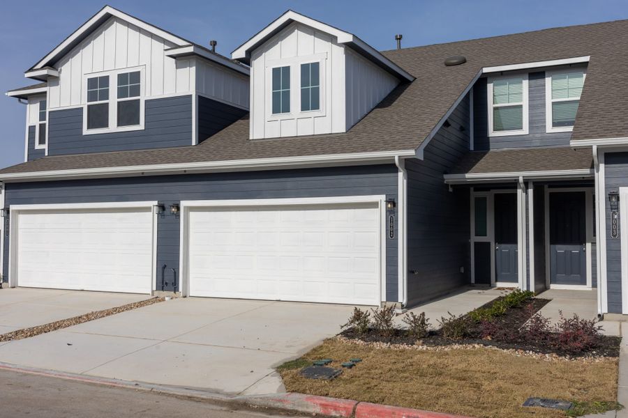 Front exterior of a new home in Center 45, Round Rock, TX, highlighting curb appeal (Image 21).