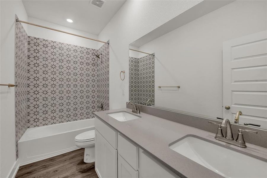 Please Note: These interior photos are not of the actual home but are of a completed one with a similar floor plan. Finishes, features, and layouts may vary.