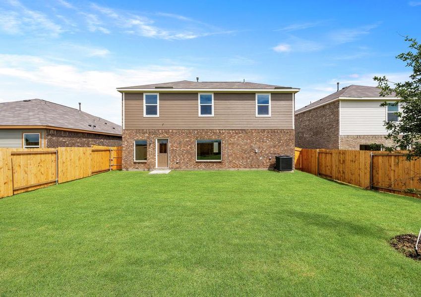 The back yard of the Cypress is large and fully fenced-in.