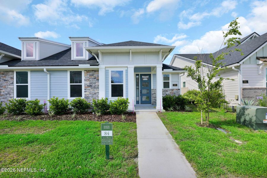 Front exterior of a new home in , Ponte Vedra, FL, highlighting curb appeal (Image 32). Front exterior of a new home in , Ponte Vedra, FL, highlighting curb appeal (Image 32).