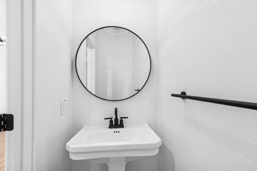 Half bath (*Photo not of actual home and used for illustration purposes only.) Half bath (*Photo not of actual home and used for illustration purposes only.)