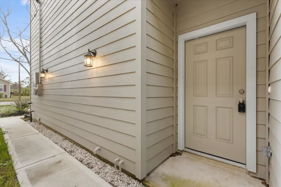 Exterior details and patio area of a home in , Houston (Image 3).