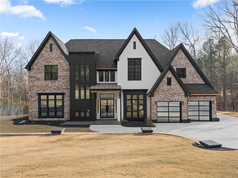 Front exterior of a new home in , Loganville, GA, highlighting curb appeal (Image 30). Front exterior of a new home in , Loganville, GA, highlighting curb appeal (Image 30).