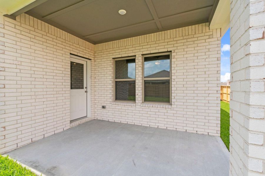 Exterior details and patio area of a home in Windrose Green, Angleton (Image 3). Exterior details and patio area of a home in Windrose Green, Angleton (Image 3).