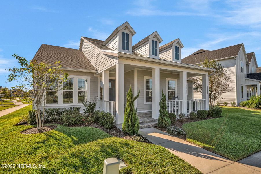 Front exterior of a new home in Seven Pines, Jacksonville, FL, highlighting curb appeal (Image 1). Front exterior of a new home in Seven Pines, Jacksonville, FL, highlighting curb appeal (Image 1).