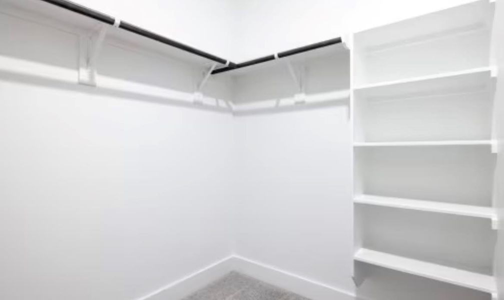 Spacious, unfurnished interior of a new home in Ryegrass Collection – Freedom at Anthem, Kyle (Image 10).