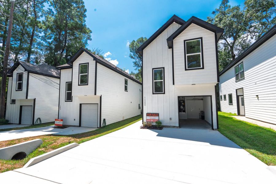 Front exterior of a new home in , Willis, TX, highlighting curb appeal (Image 26). Front exterior of a new home in , Willis, TX, highlighting curb appeal (Image 26).