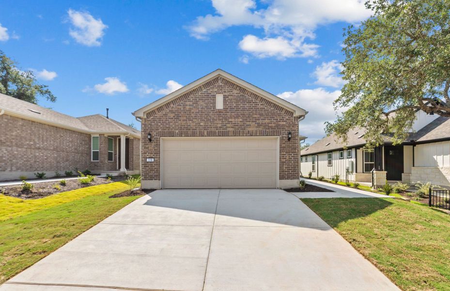 Front exterior of a new home in Sun City Texas, Georgetown, TX, highlighting curb appeal (Image 20). Front exterior of a new home in Sun City Texas, Georgetown, TX, highlighting curb appeal (Image 20).