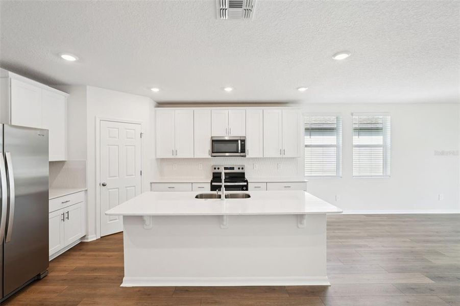 Furnished interior view inside a new home in The Meadow at Crossprairie, St. Cloud (Image 9).