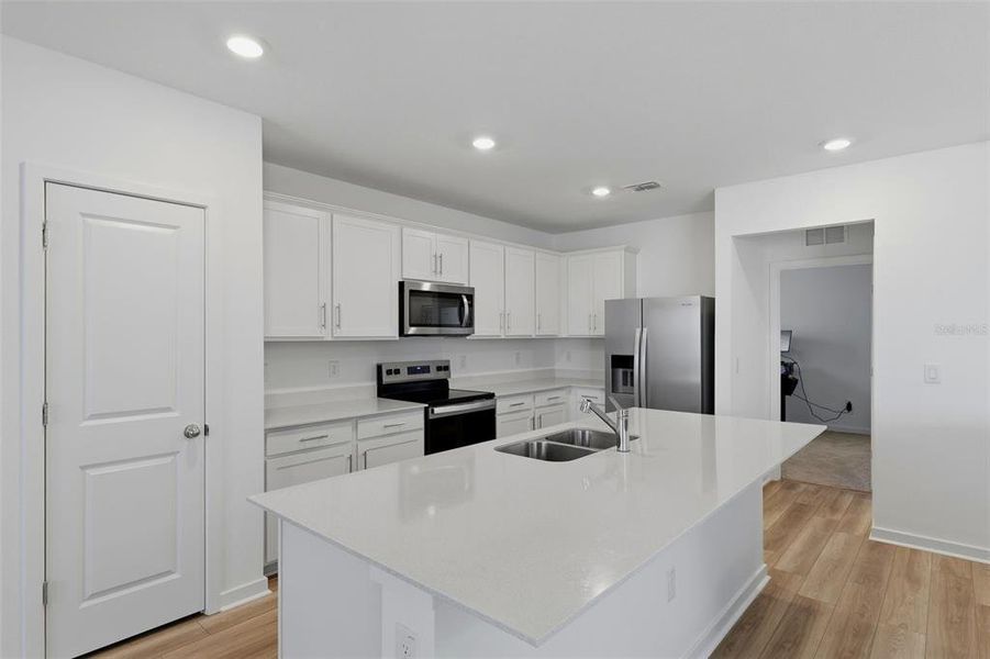 Furnished interior view inside a new home in Oakfield Lakes, Parrish (Image 9).