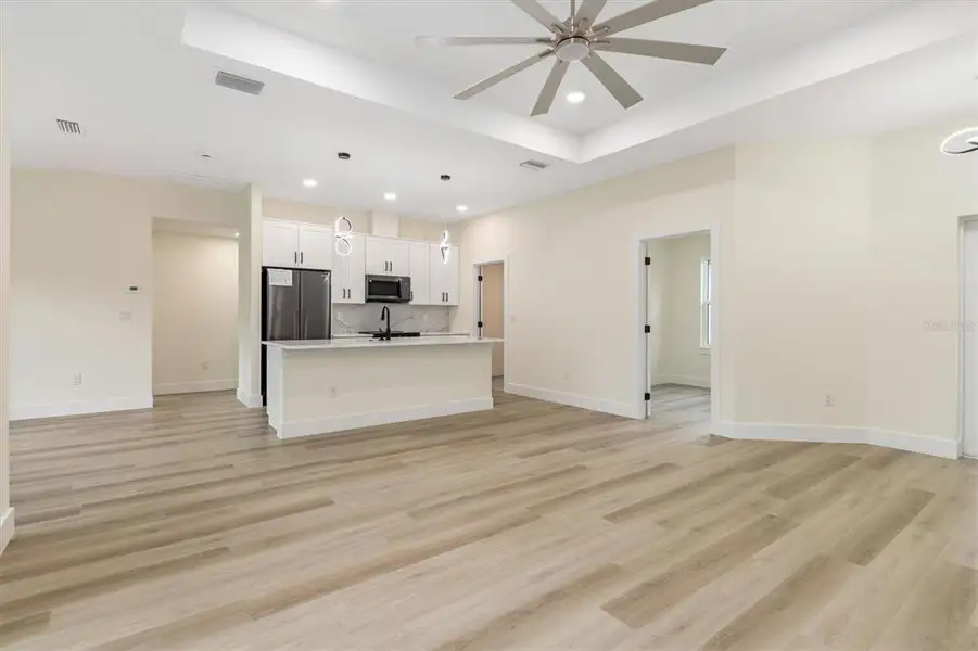 Spacious, unfurnished interior of a new home in , Port Charlotte (Image 24).