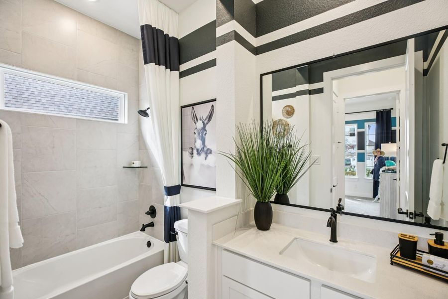 Furnished interior view inside a new home in Bridgeland, Cypress (Image 37).