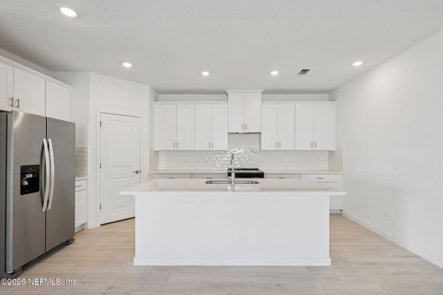 Furnished interior view inside a new home in Colbert Landings, Palm Coast (Image 7).