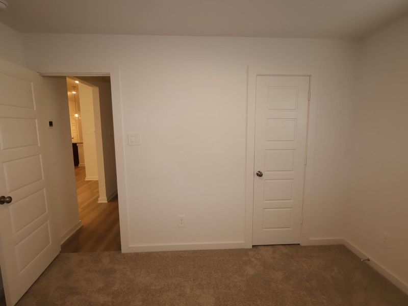 Spacious, unfurnished interior of a new home in Pinewood at Grand Texas, New Caney (Image 29).