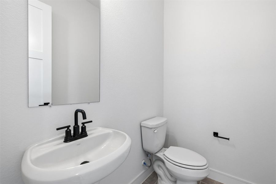 Furnished interior view inside a new home in Bridgeland Central, Cypress (Image 12).