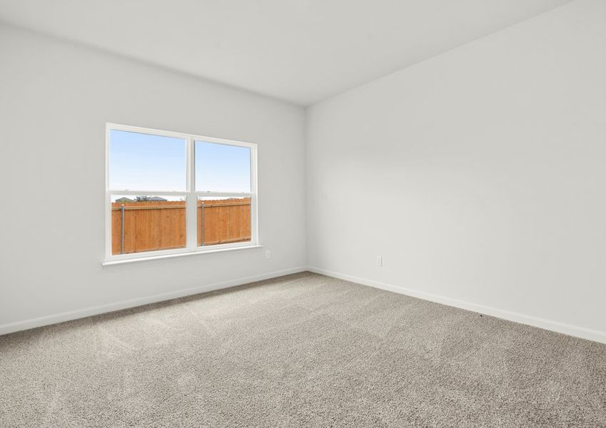 The master bedroom has a large window that lets in great, natural light. The master bedroom has a large window that lets in great, natural light.