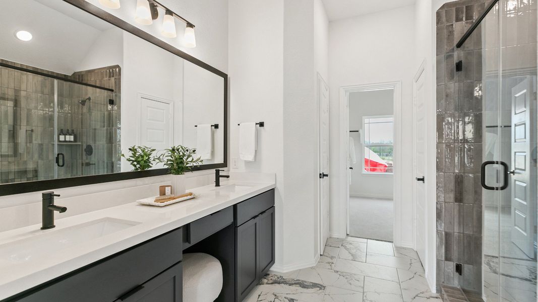 Representative furnished interior of a home built from the Mimosa by Brightland Homes in Sunterra, Katy (Image 21).