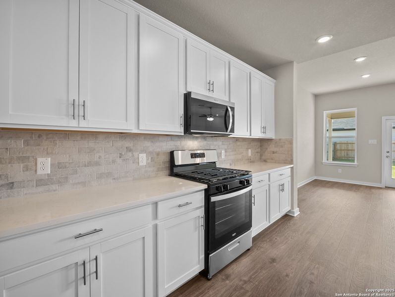 Furnished interior view inside a new home in Morgan Meadows, San Antonio (Image 9).