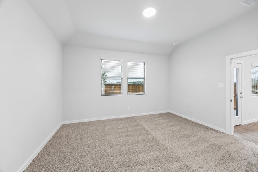 Primary Suite in the Cedar home plan by Trophy Signature Homes – REPRESENTATIVE PHOTO