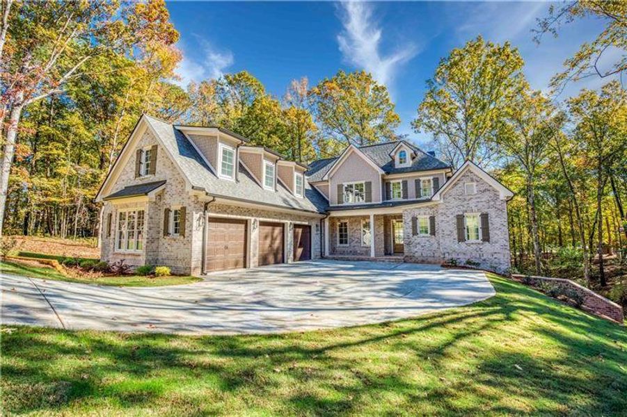 Front exterior of a new home in , Monroe, GA, highlighting curb appeal (Image 1). Front exterior of a new home in , Monroe, GA, highlighting curb appeal (Image 1).