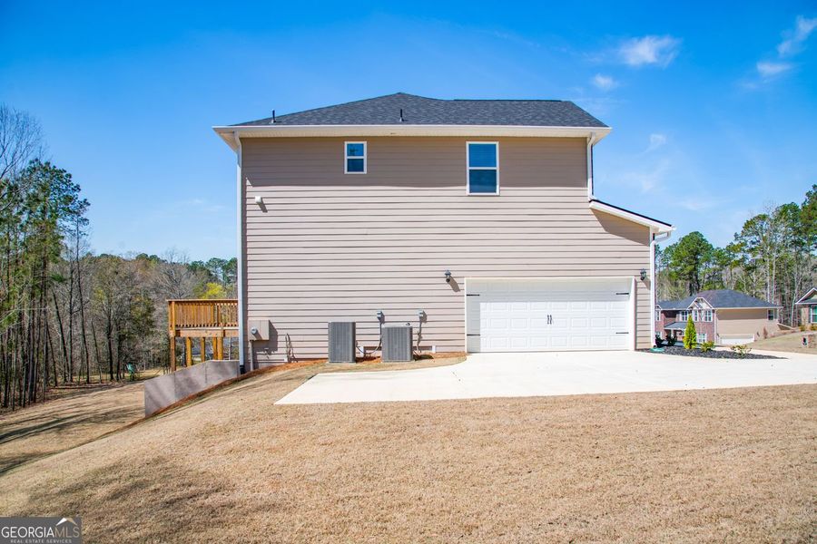 Front exterior of a new home in Carson's Walk, Macon, GA, highlighting curb appeal (Image 14).