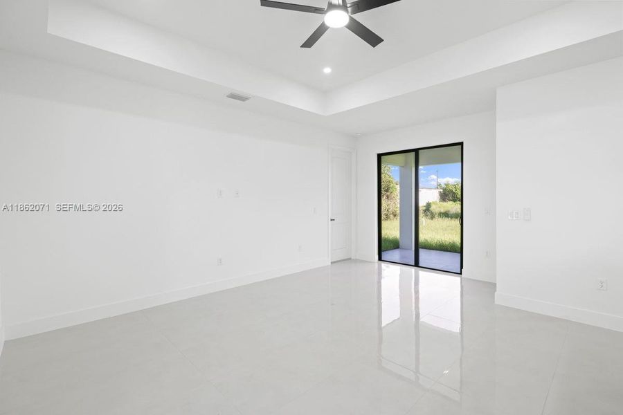 ACTUAL LIVING AREA LEADING TO OUTSIDE DOUBLE SLIDING DOORS