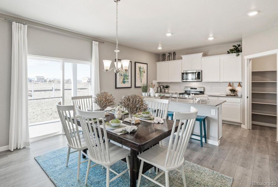 Furnished interior view inside a new home in Trails at Crowfoot, Parker (Image 22).