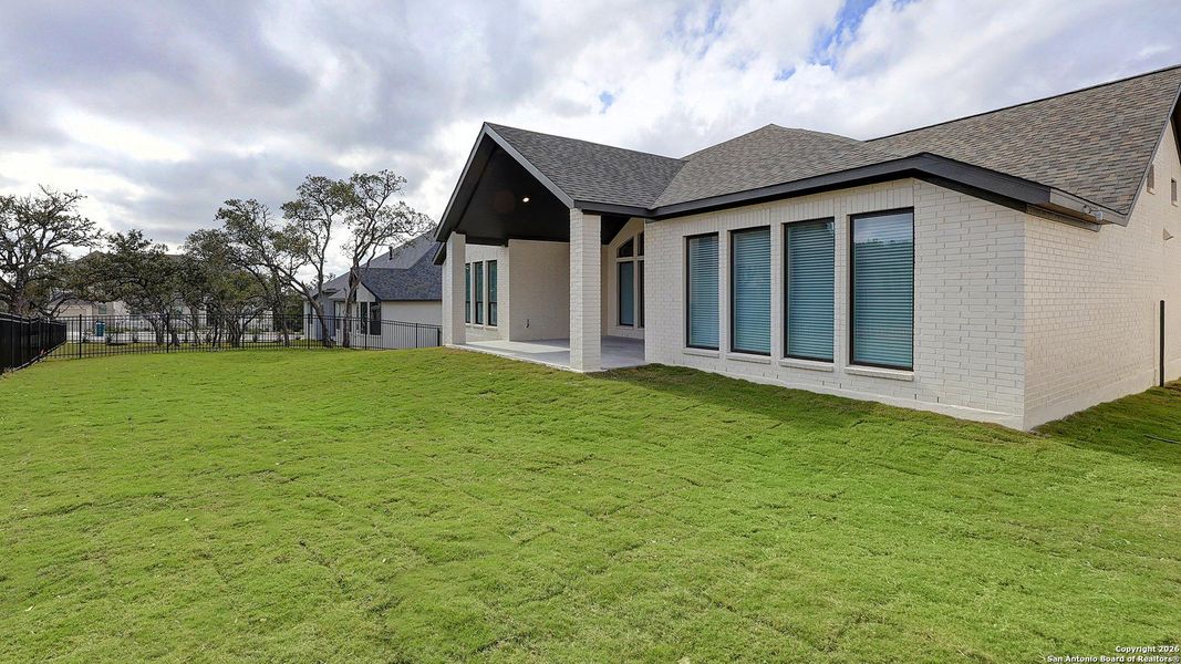 Exterior details and patio area of a home in Esperanza 80', Boerne (Image 26).