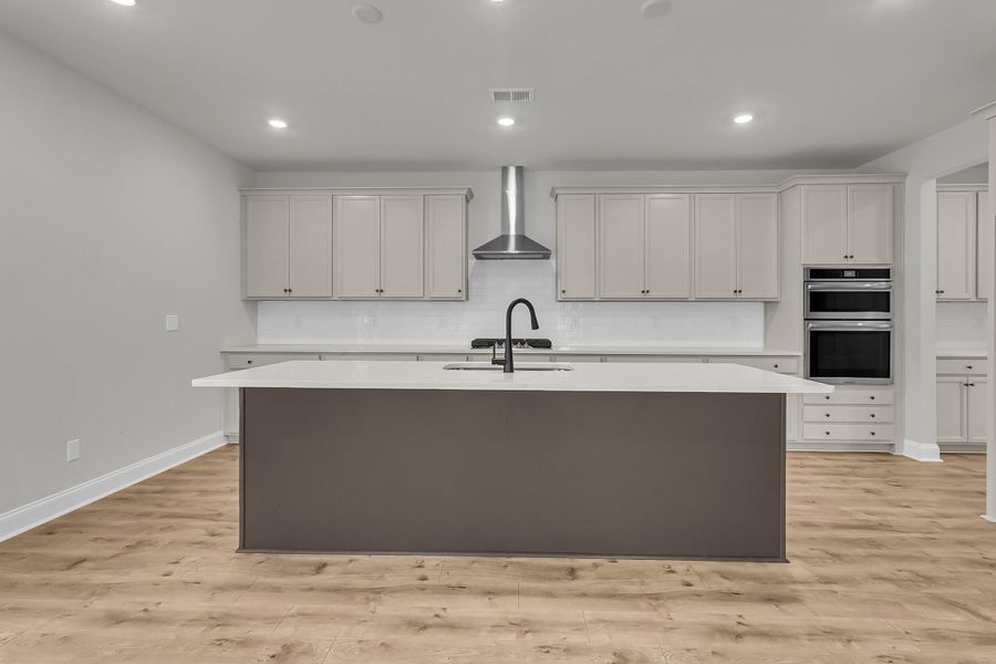 Furnished interior view inside a new home in Tidewater at Lakes of Cane Bay, Summerville (Image 7).