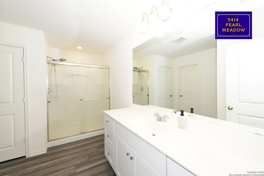 Furnished interior view inside a new home in Liberte, Converse (Image 8).