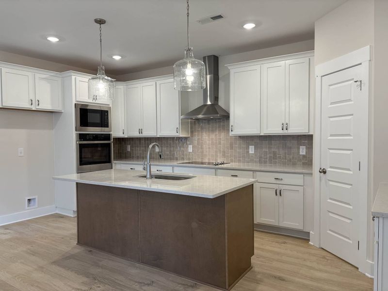 Furnished interior view inside a new home in The Paddock, Gallatin (Image 4).